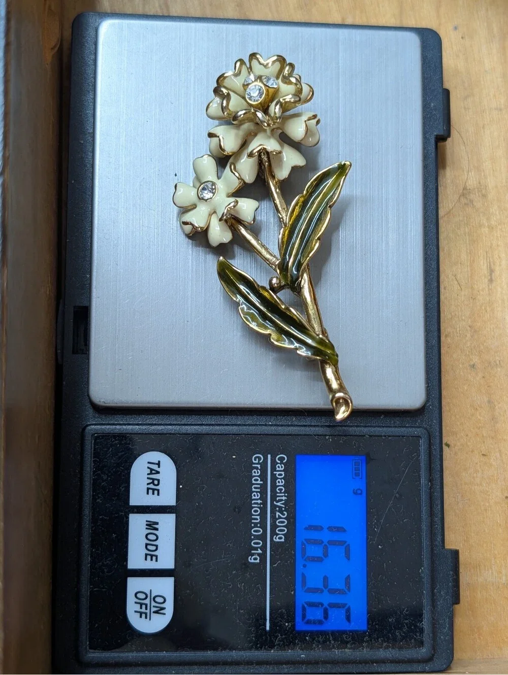 Vintage Monet Cream Enamel Flower Brooch Pin Gold Tone Rhinestone Floral Stem